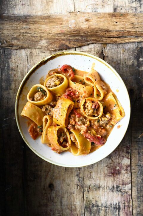 Creamy Beef Bolognese With Roasted Peppers Serving Dumplings